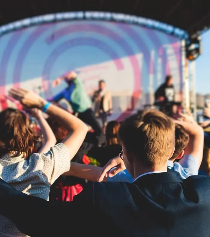 Outdoor concert audience enjoying performance