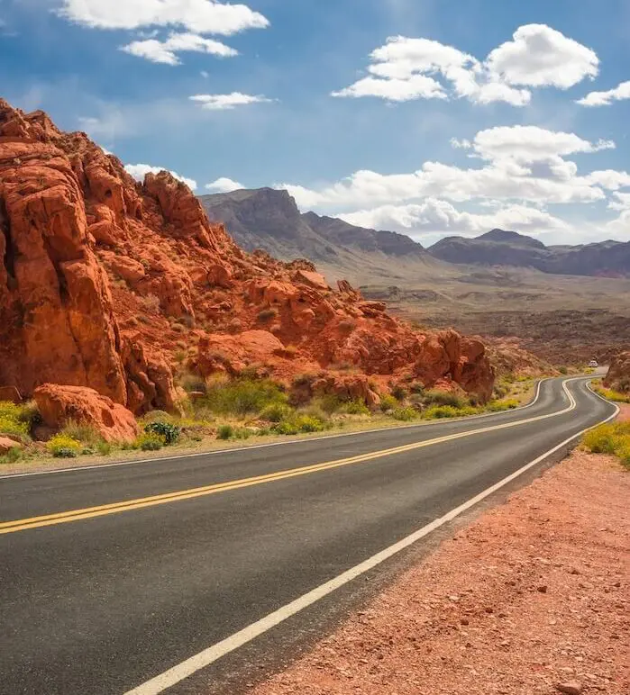 Desert road winding through canyon