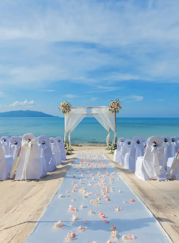 Beachfront wedding ceremony setup