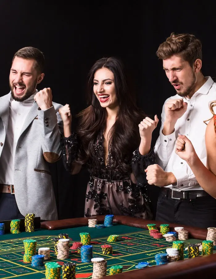 People celebrating at roulette table