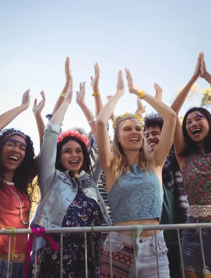 People enjoying outdoor music festival