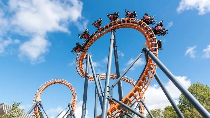 Roller coaster loop against sky